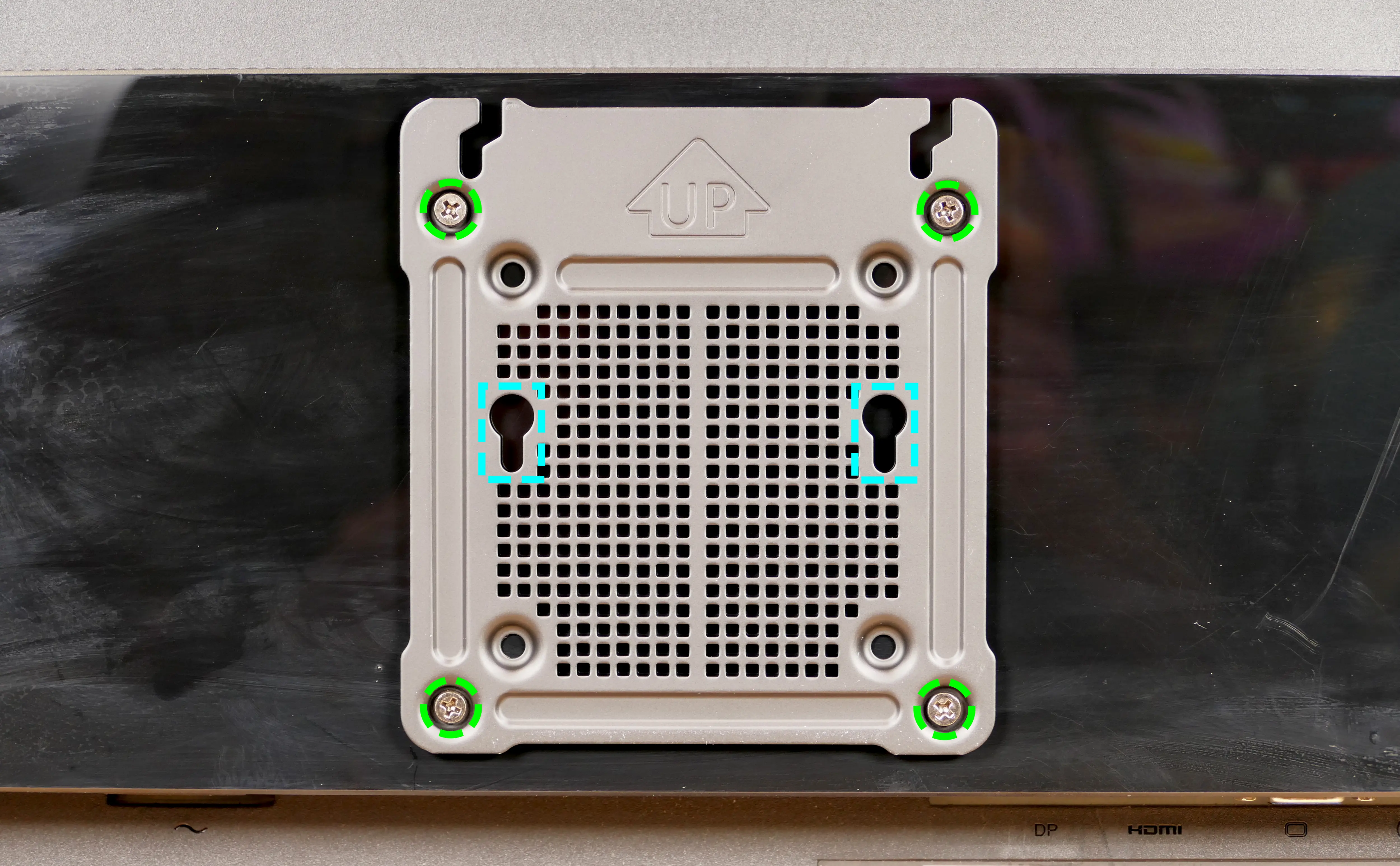 VESA mounting plate on display