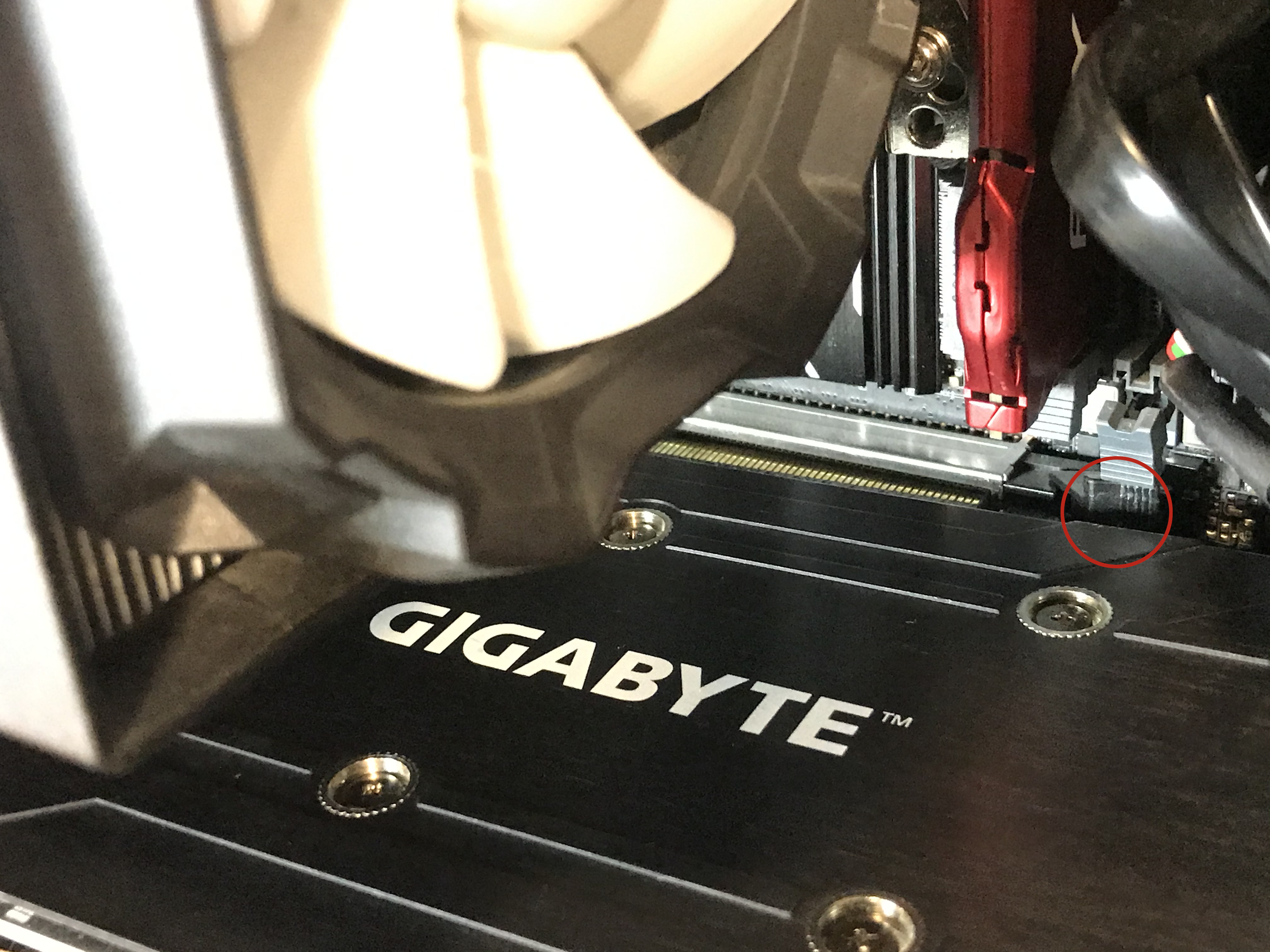 Close view of the GPU leaving the PCIe slot
